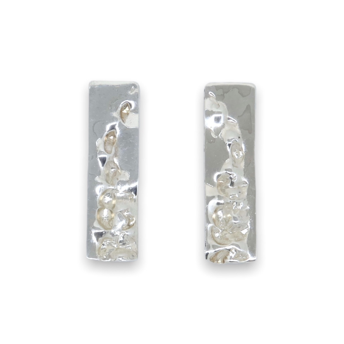 boucles d'oreilles à croquer argent fond blanc